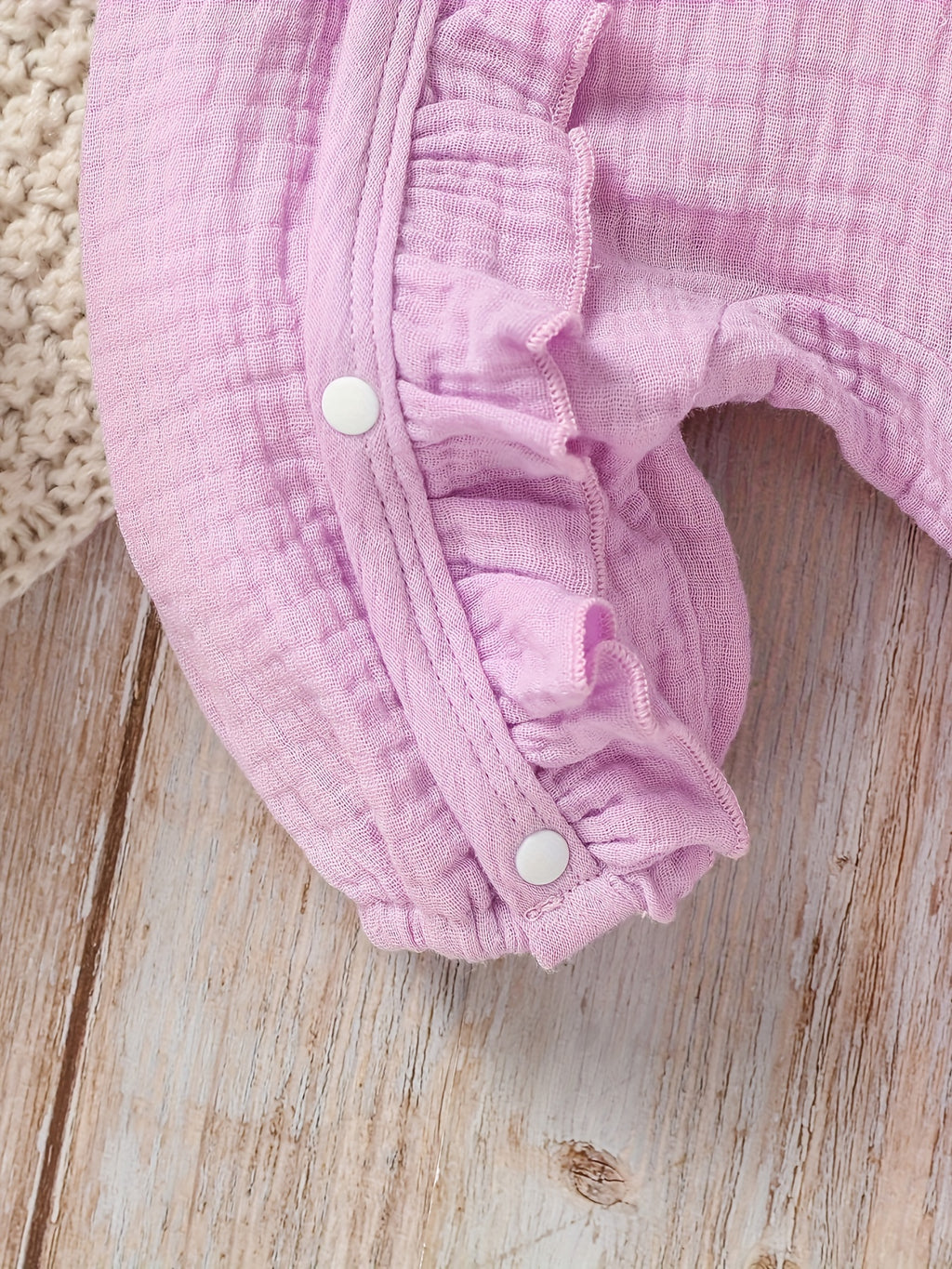 Newborn muslin bodysuit