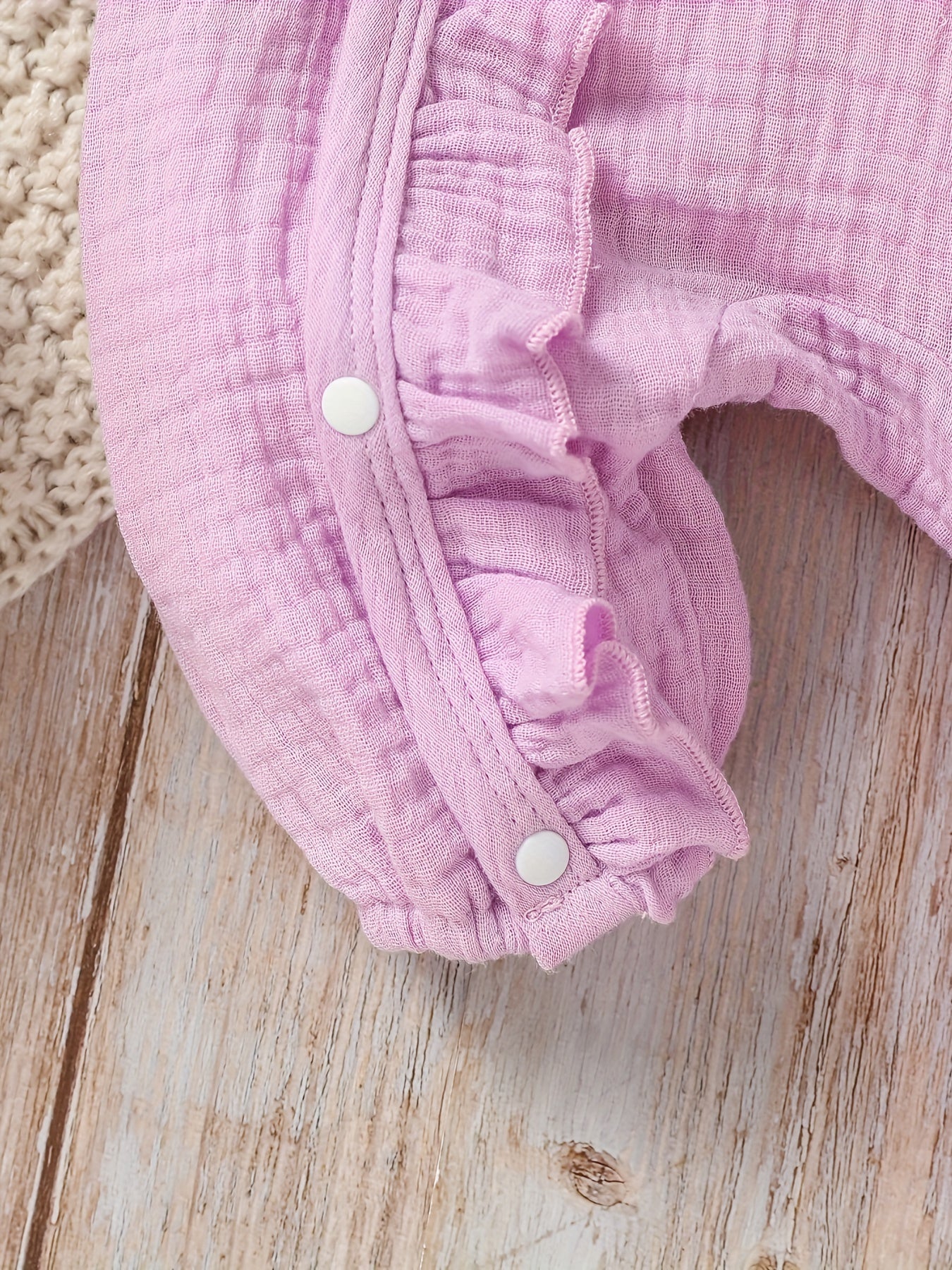 Newborn muslin bodysuit