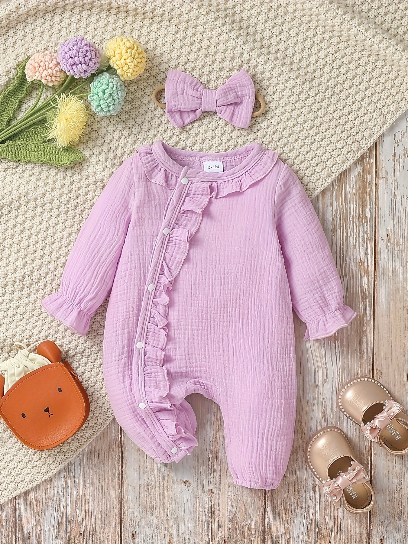 Newborn muslin bodysuit