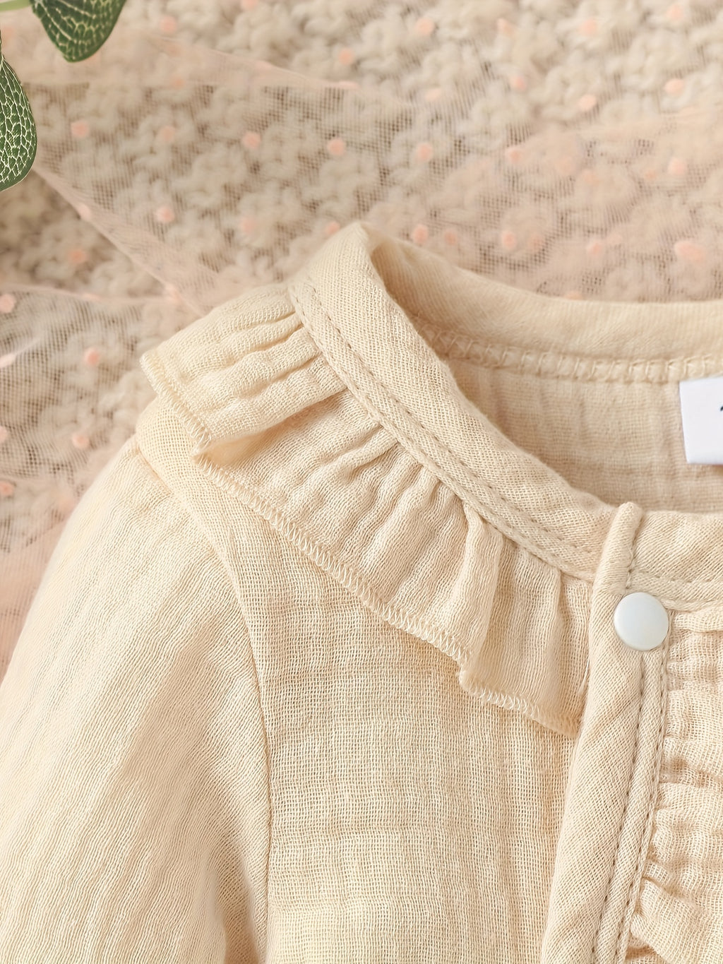 Newborn muslin bodysuit
