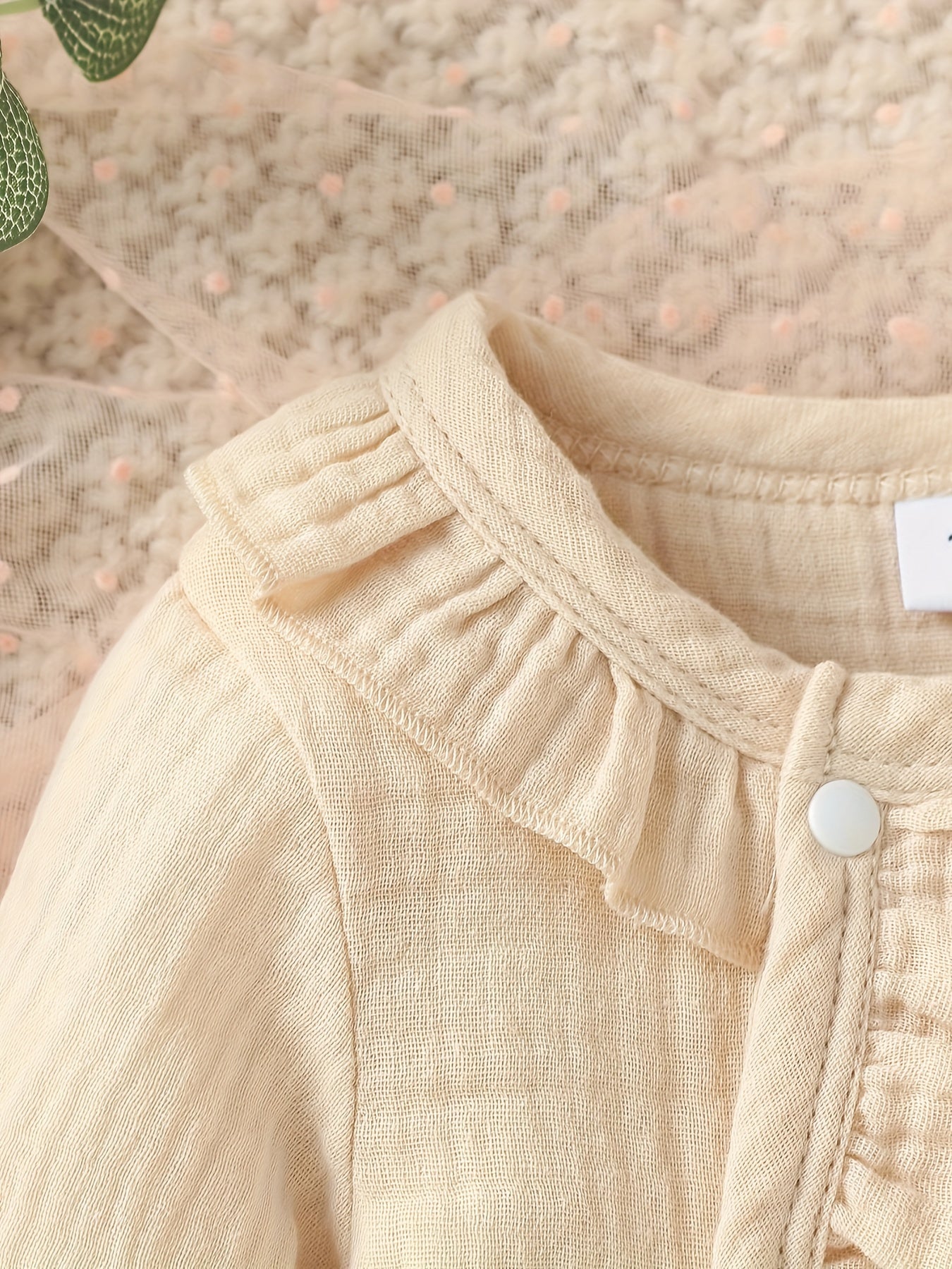 Newborn muslin bodysuit