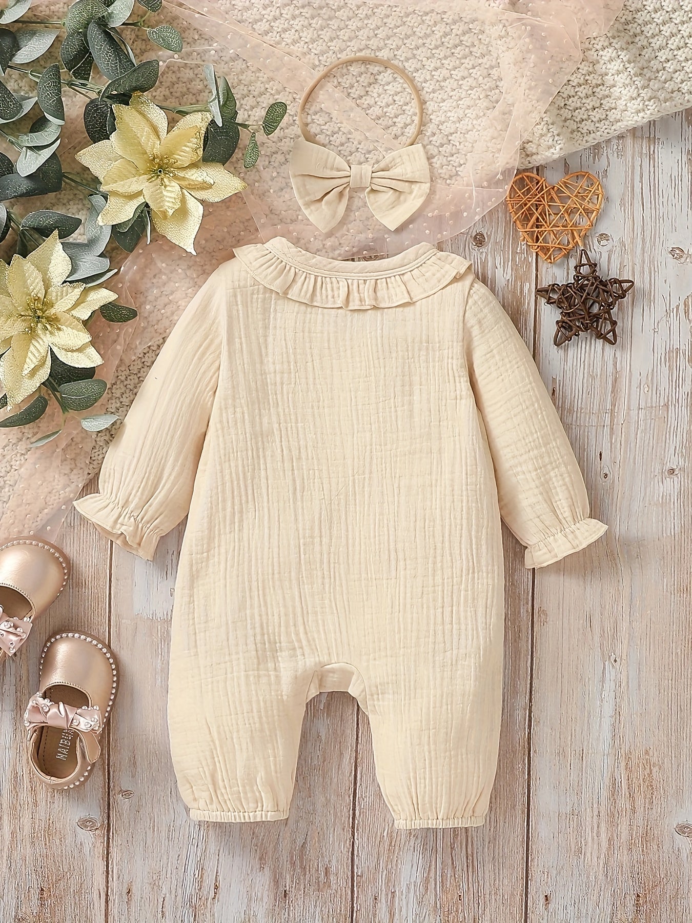 Newborn muslin bodysuit