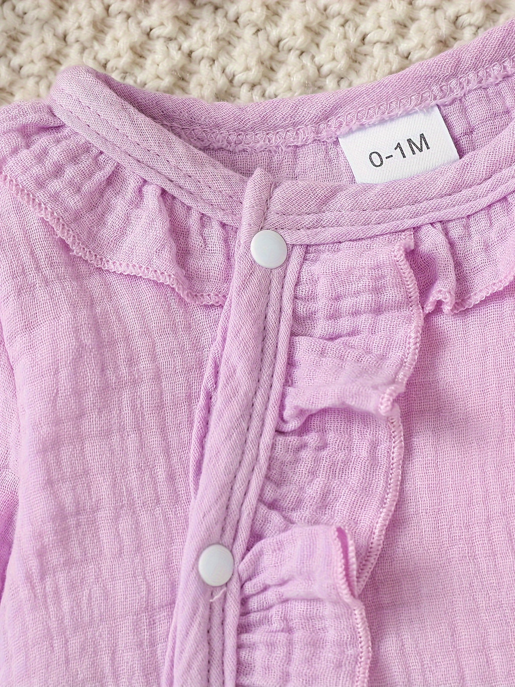 Newborn muslin bodysuit