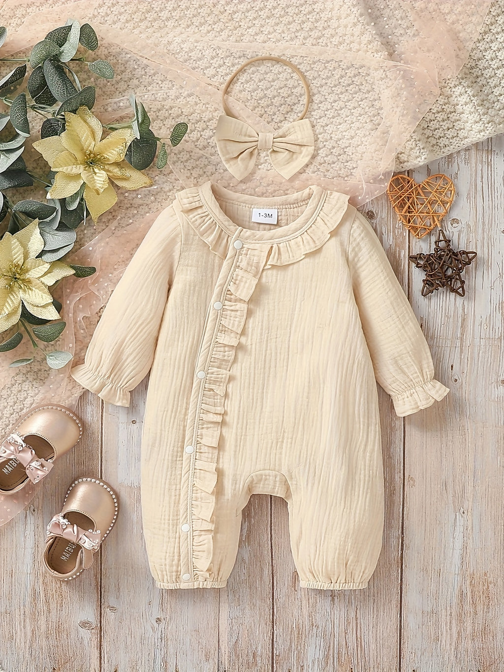 Newborn muslin bodysuit
