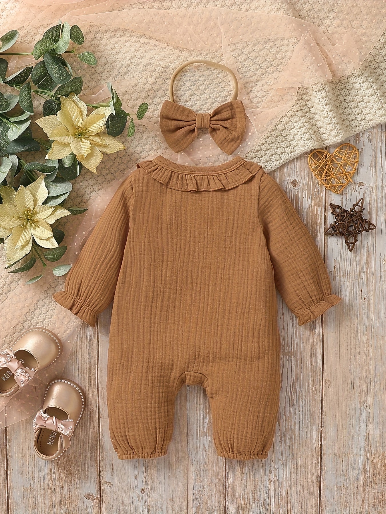 Newborn muslin bodysuit