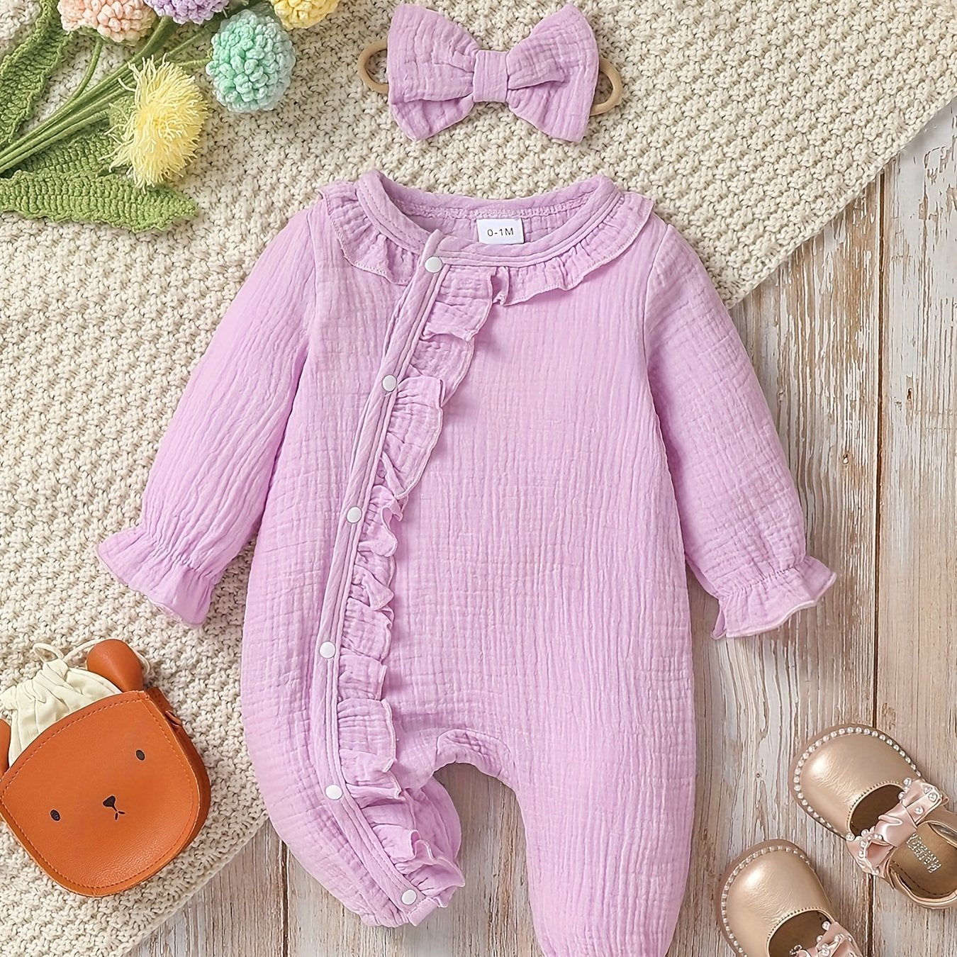 Newborn muslin bodysuit